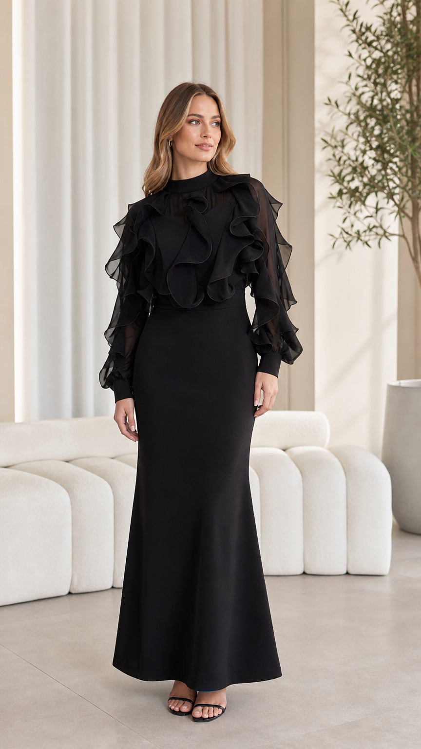 Front view of woman wearing elegant black ruffled long-sleeve maxi dress