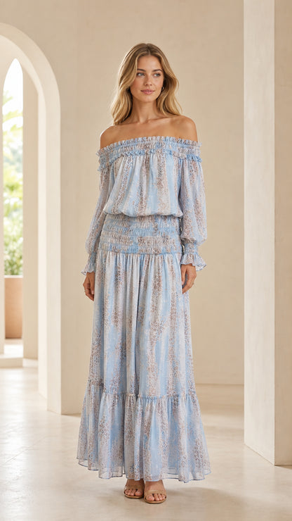 Front view of woman wearing Light Blue off-the-shoulder smocked tiered maxi dress