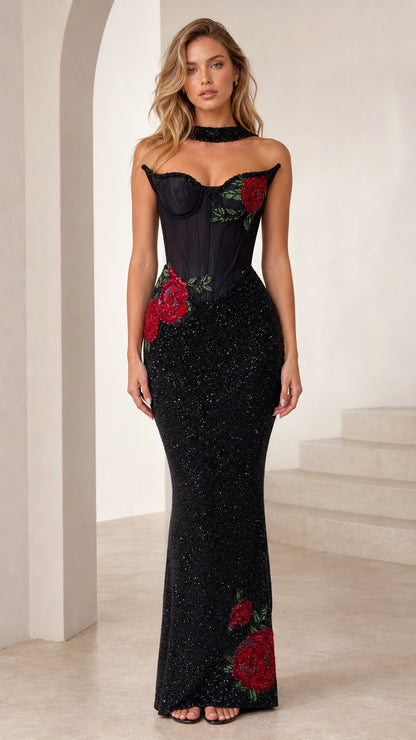 Front view of black rose applique corset mermaid evening gown