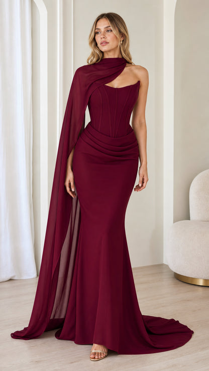 Burgundy corset bodice evening gown with flowing chiffon cape front view