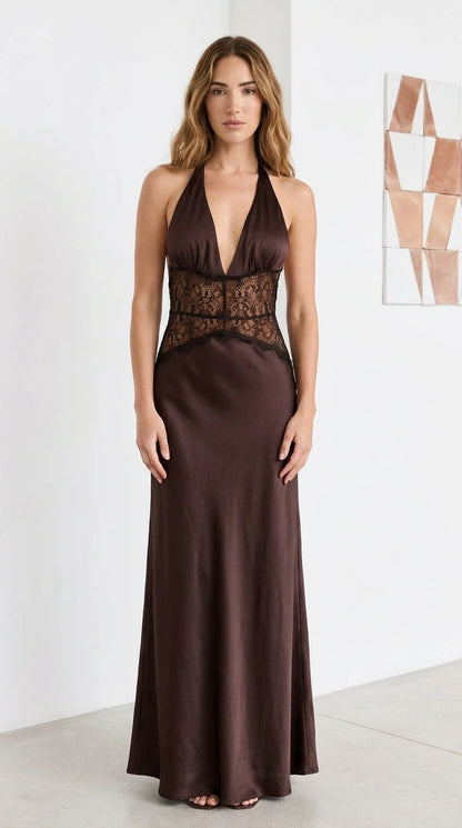 Front view of model wearing brown satin halter maxi dress