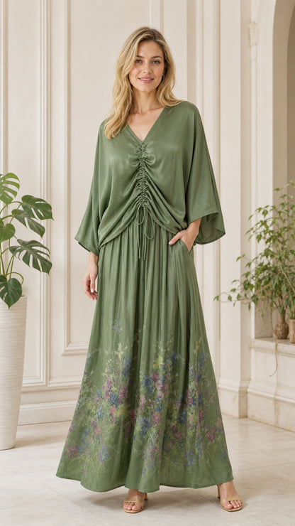 Front view of olive green boho floral ruched maxi dress