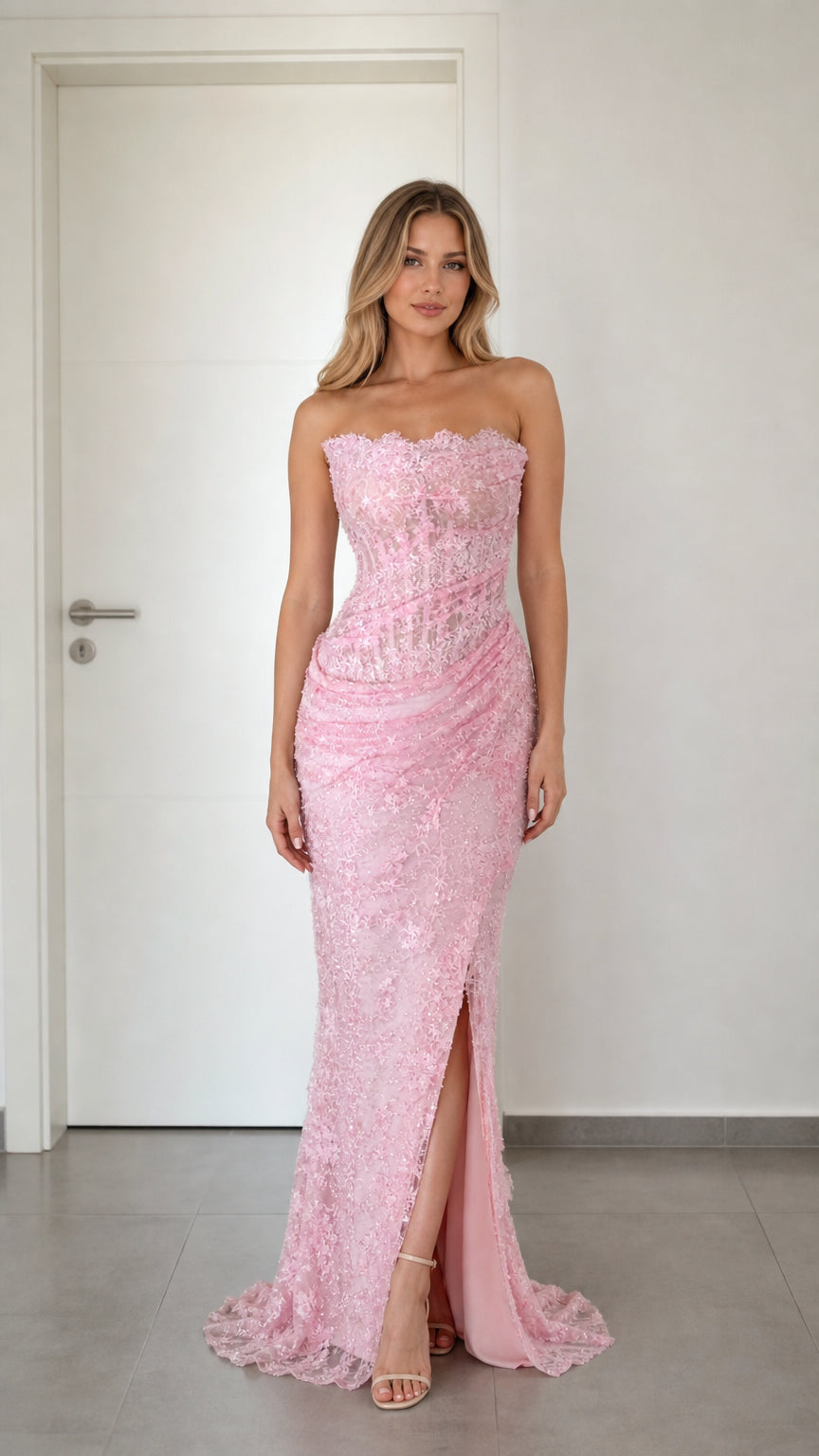 Front view of pink strapless sequin lace formal evening dress with high slit