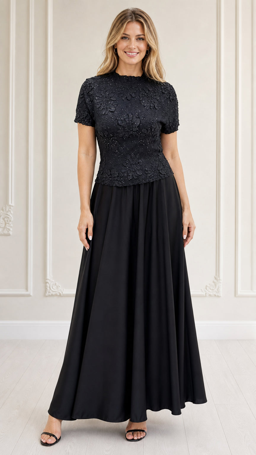 Front view of model wearing black textured floral bodice maxi dress