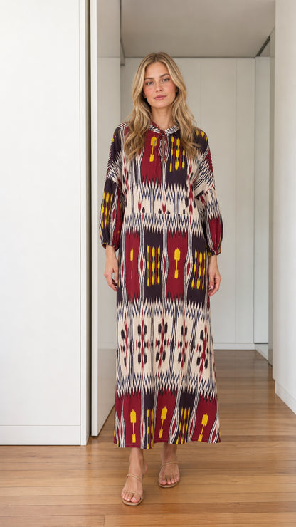 Front view of burgundy printed long sleeve maxi dress
