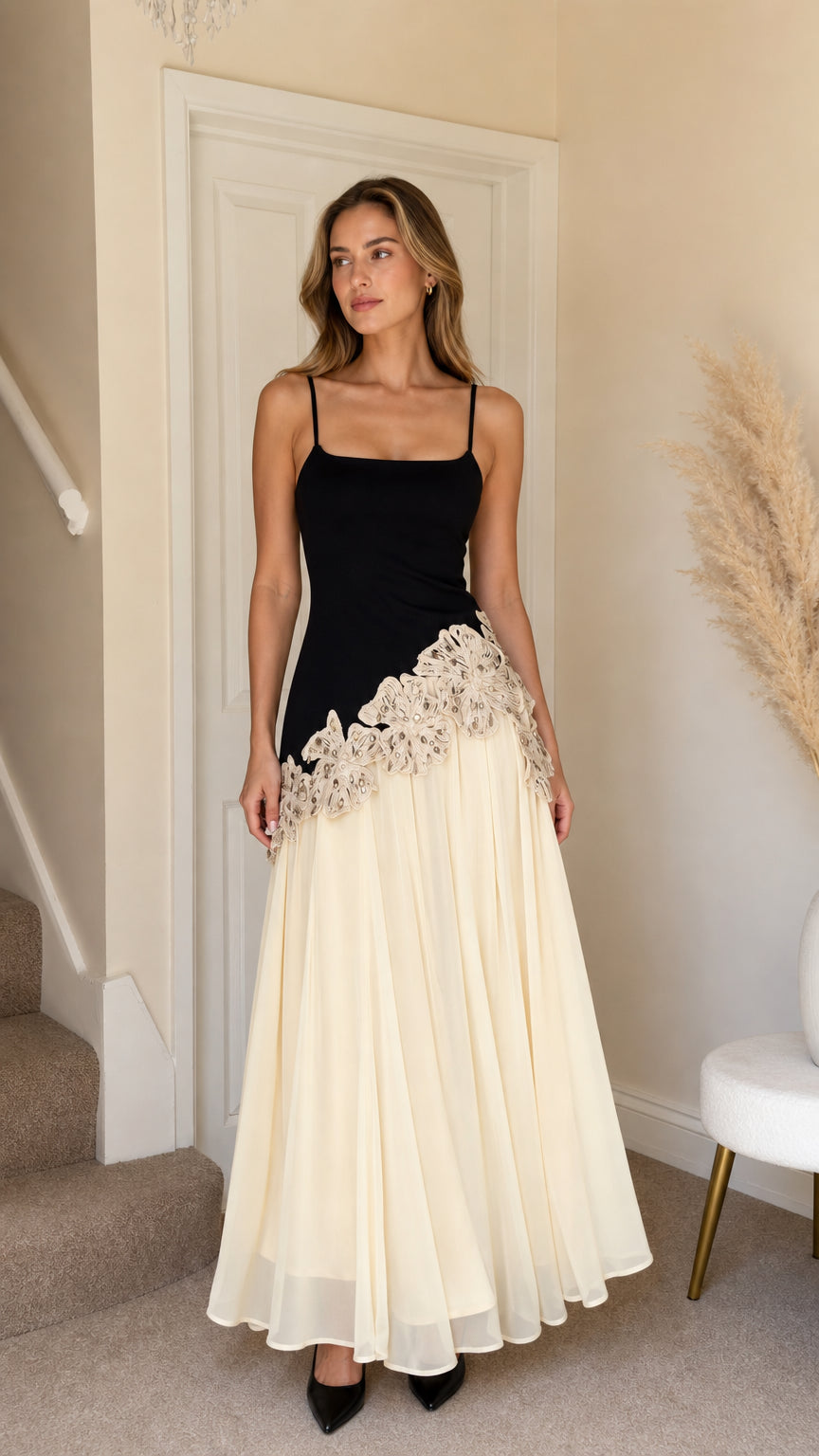 Front full view of Black elegance applique asymmetric long dress