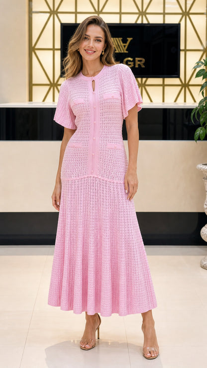 Front view of model wearing pink knit midi dress