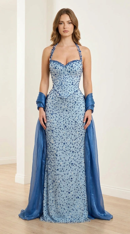 Front view of light blue embellished halter evening gown with wrap