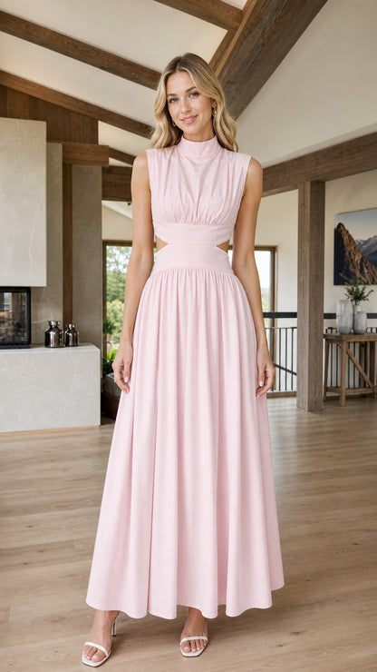 Front view of woman wearing pink mock neck cutout maxi dress