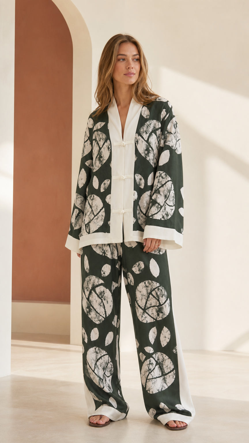 Woman wearing Forest Green printed lounge set from the front