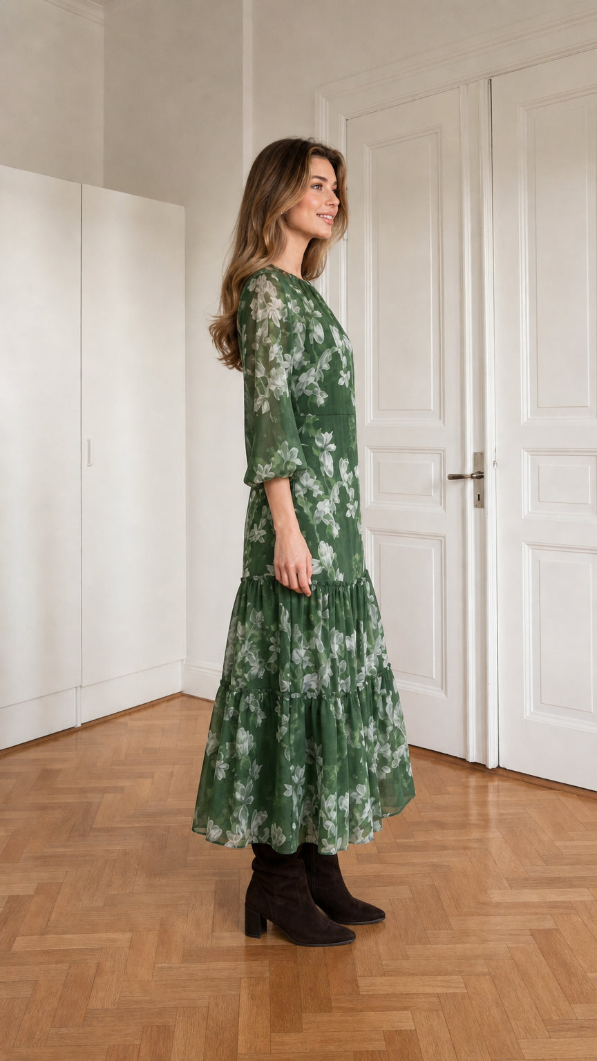 Side profile of woman in green floral midi dress