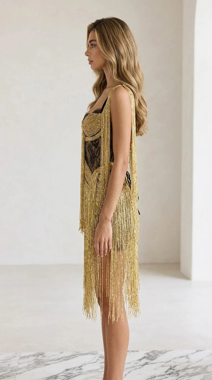 Side view of the gold fringe dress showing silhouette