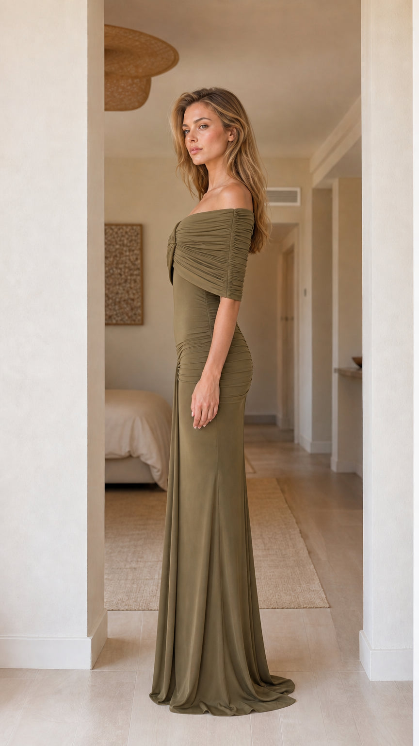 Side profile view of olive evening dress