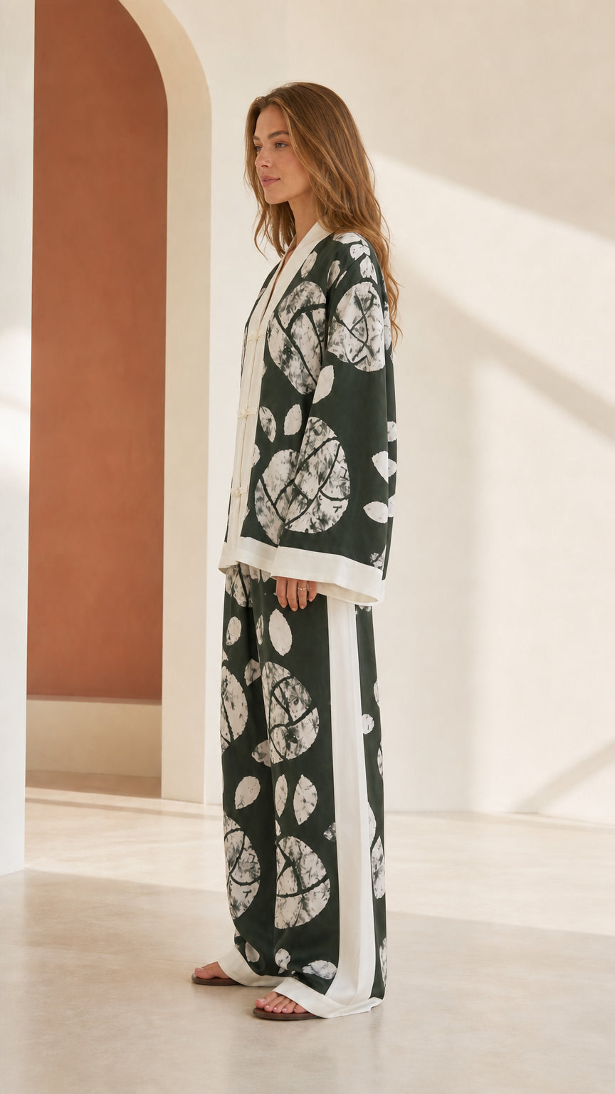 Side profile of woman wearing Forest Green printed lounge set