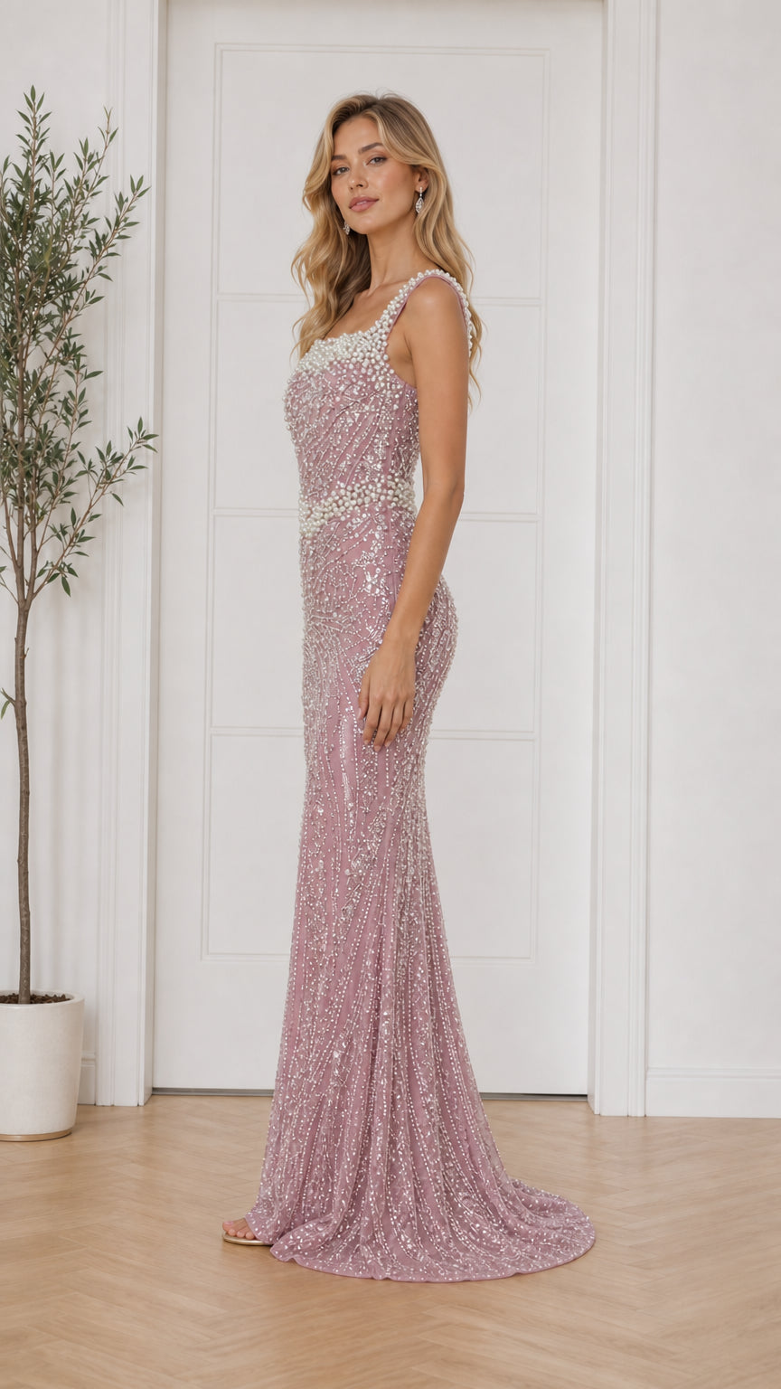 Side profile view of dusty pink formal gown