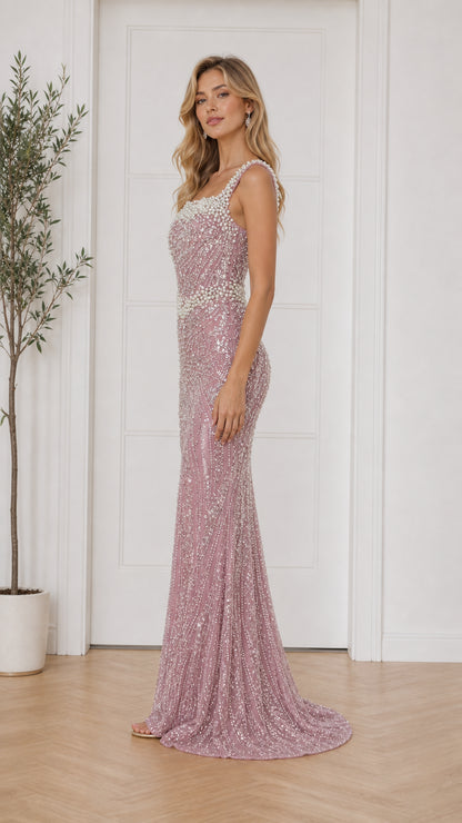 Side profile view of dusty pink formal gown