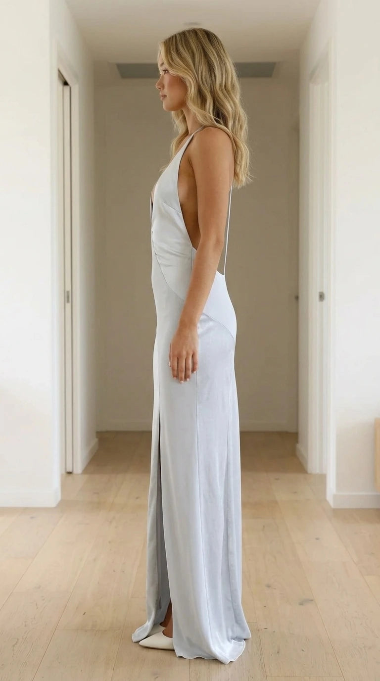 White satin-look maxi dress showing the fluid side profile and long skirt
