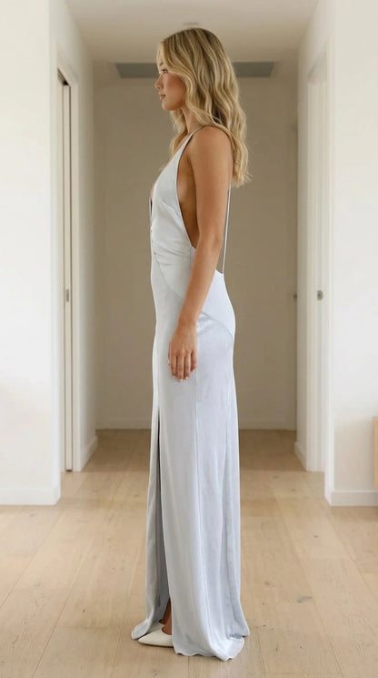 White satin-look maxi dress showing the fluid side profile and long skirt