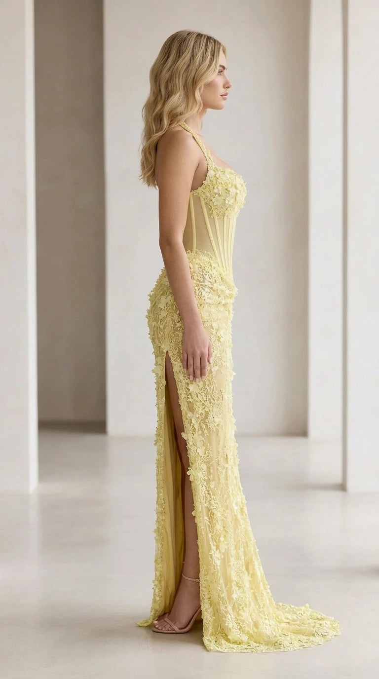 Side view of yellow formal gown showing high leg slit