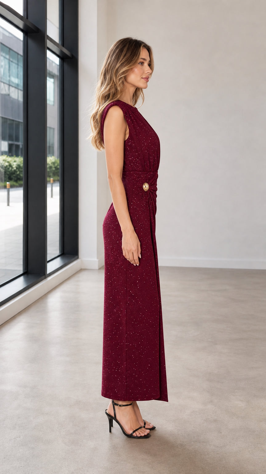 Side profile of Wine Red shimmer column dress showing flattering silhouette and shoulder cut
