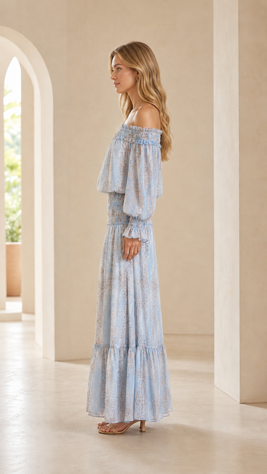 Side profile of woman in Light Blue printed off-the-shoulder long sleeve maxi dress