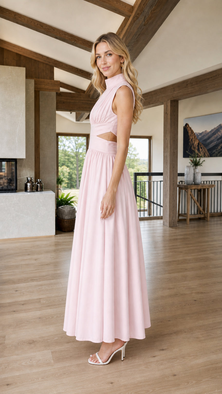 Side profile view of pink cutout maxi dress