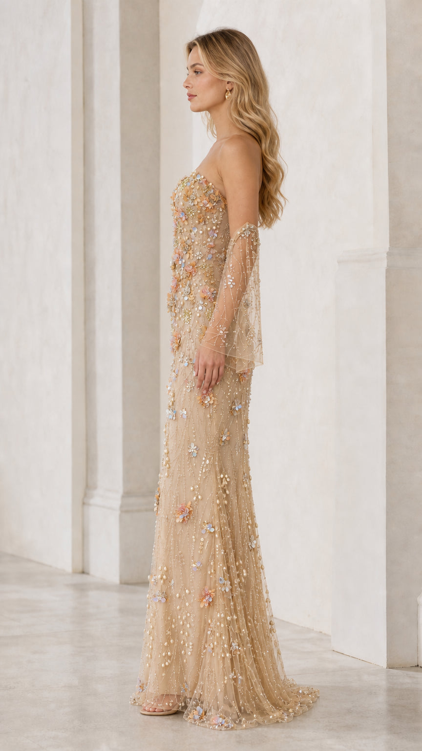 Side profile view of champagne 3D floral formal gown
