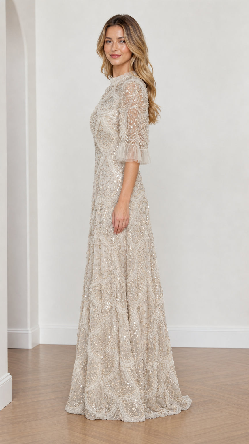 Model wearing Champagne embellished ruffle mock neck maxi dress, side view
