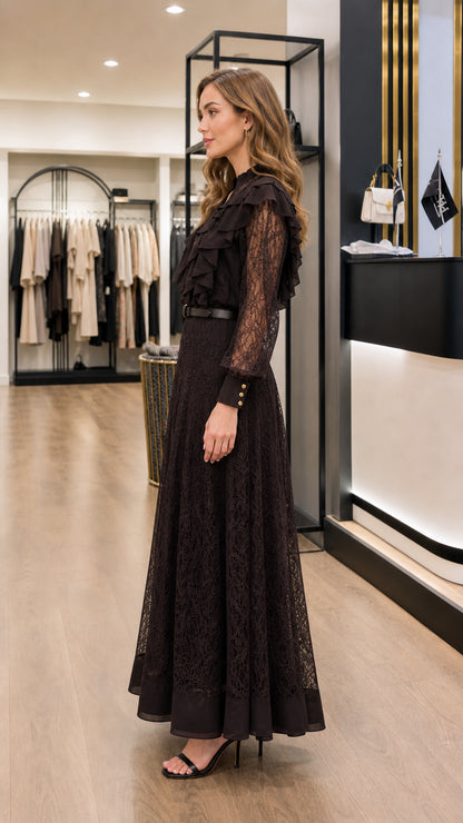 Side profile of woman wearing black ruffle lace A-line maxi dress