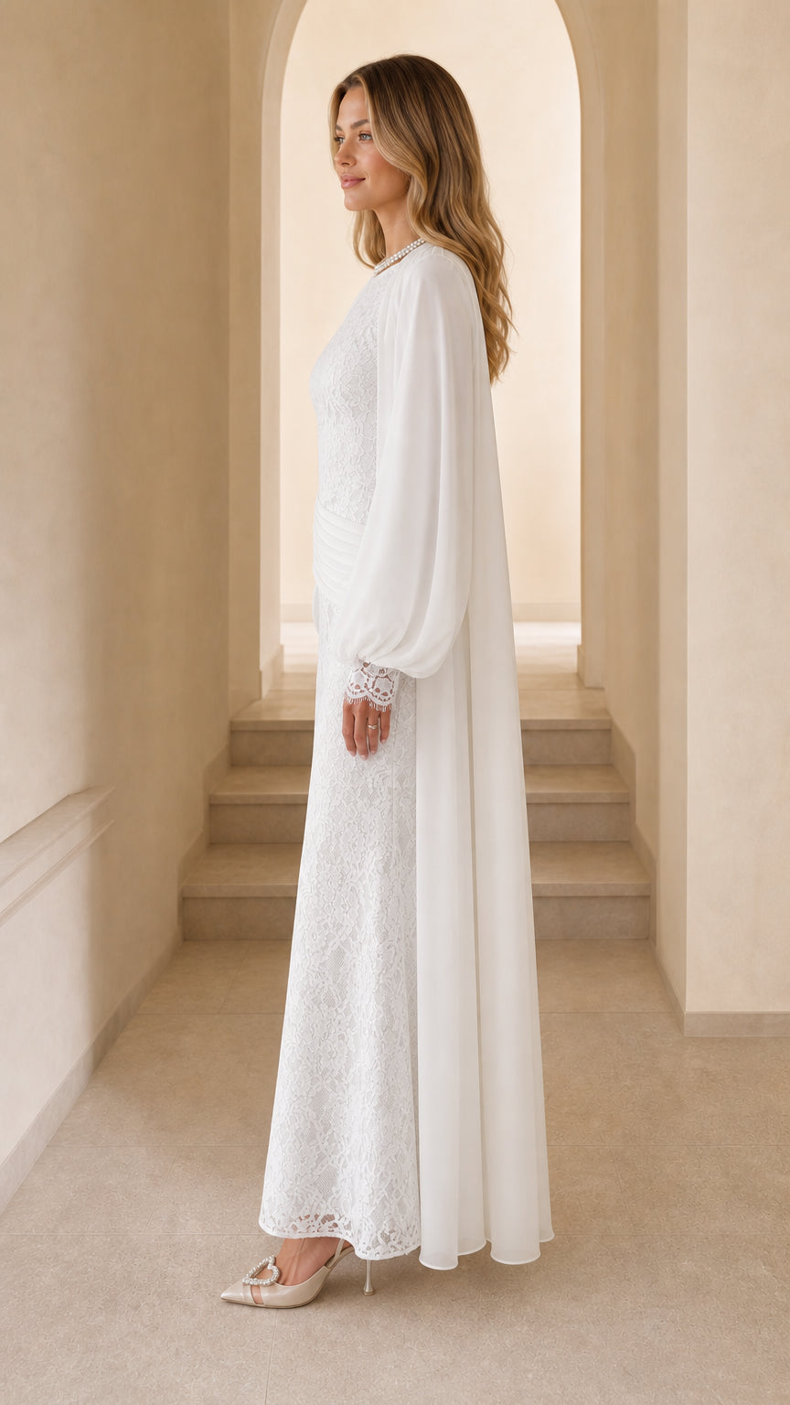 Side profile of woman in white lace gown