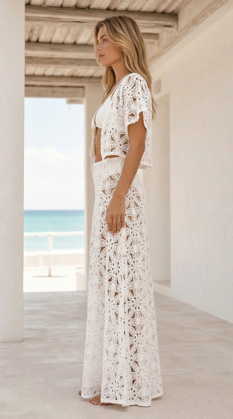 Model wearing white crochet cover-up side view