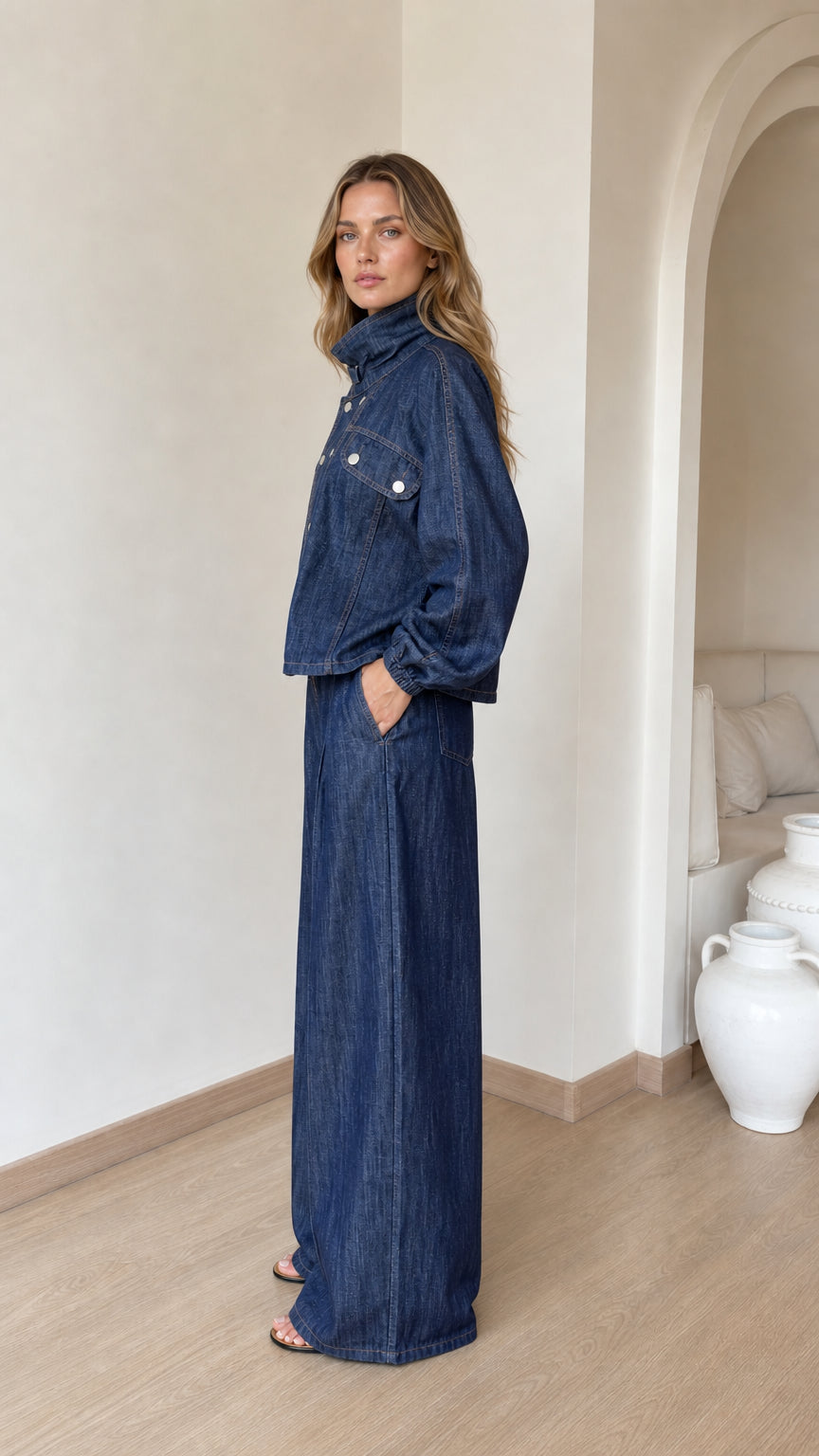 Side profile view of dark denim set