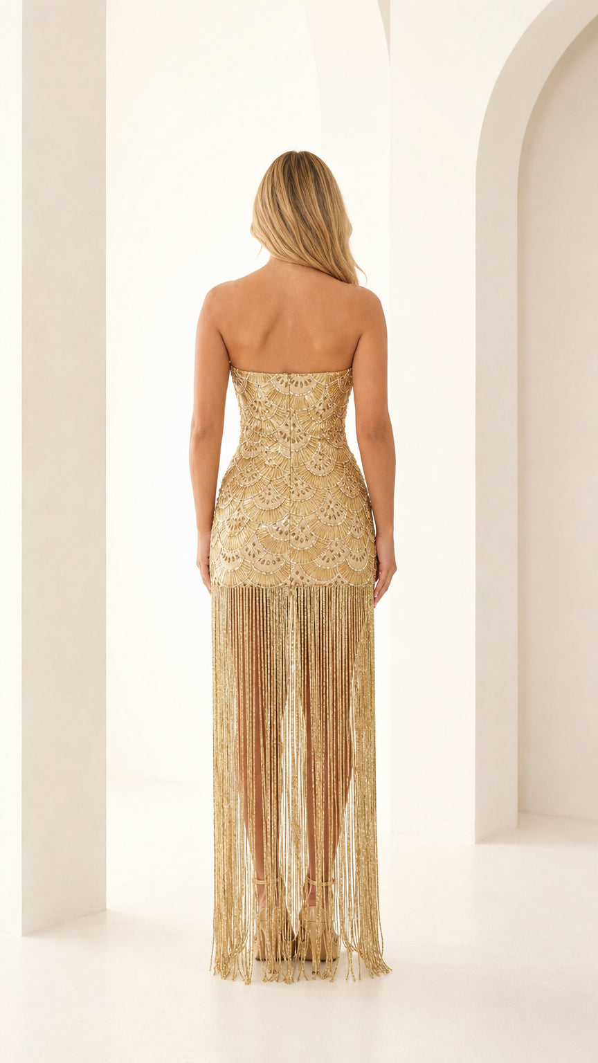 Back view of gold beaded fringe gown