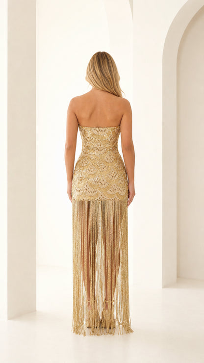 Back view of gold beaded fringe gown