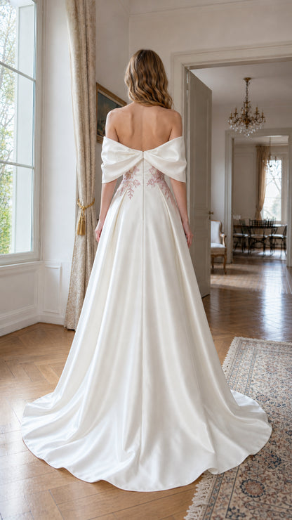Back view showing train of white formal gown