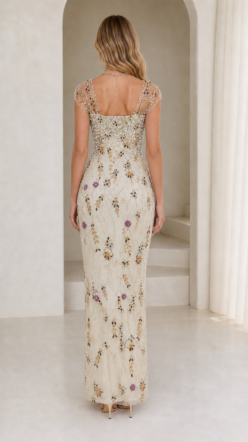 Back view of model in champagne formal dress