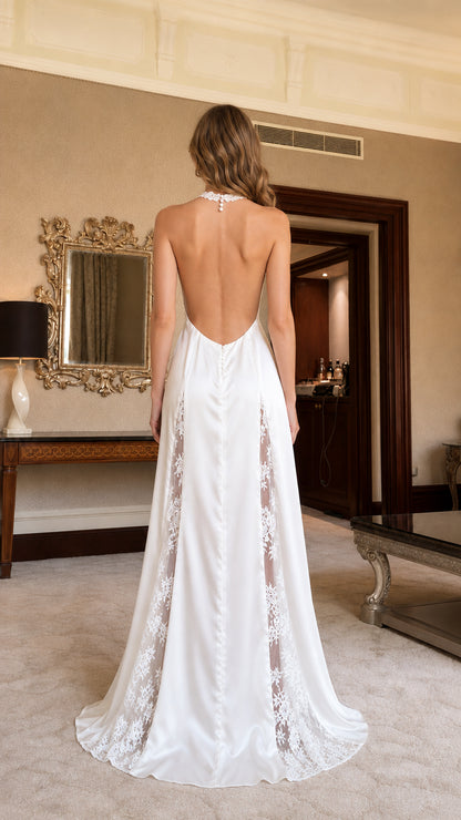 Back view of the white open-back dress