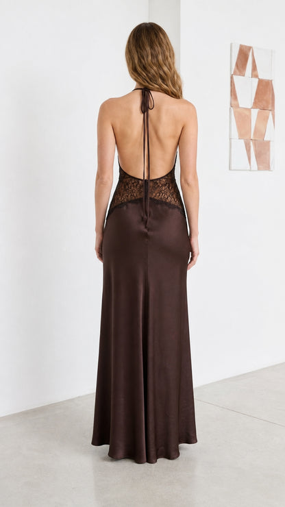Back view of model showing open back and halter ties