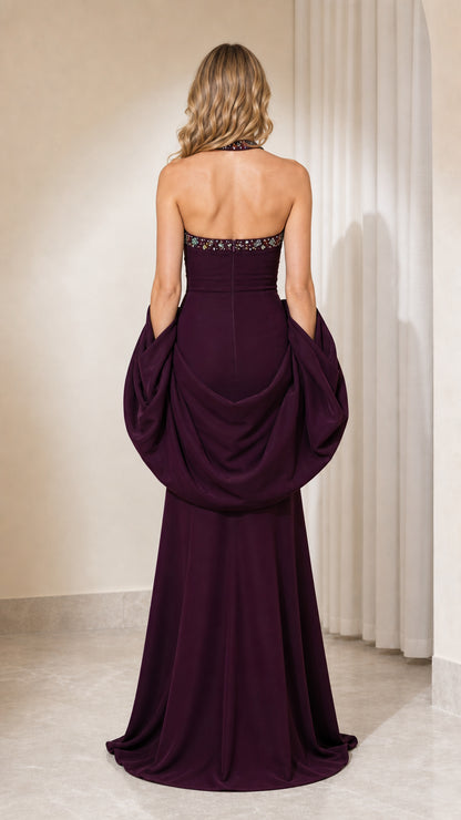Back view of plum formal dress showing draping