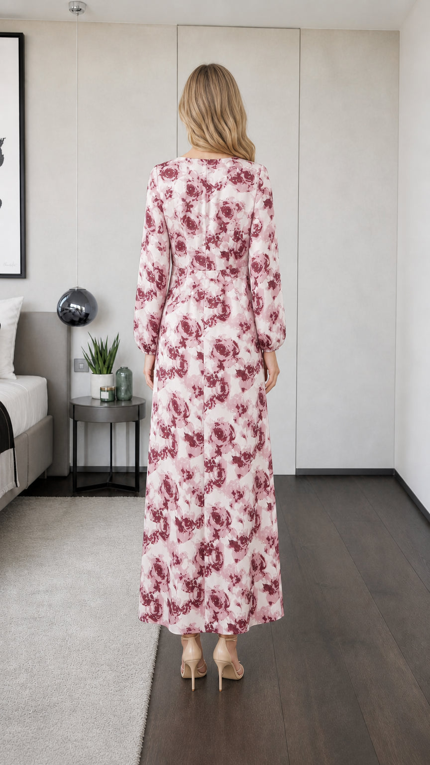 Back view of model in pink floral maxi dress