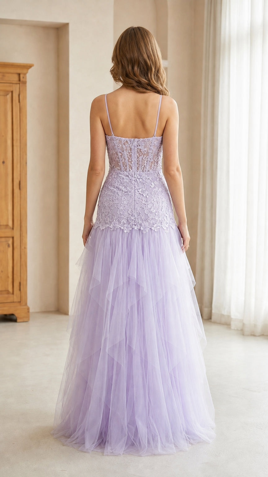 Back view of model in lavender lace corset floor-length gown