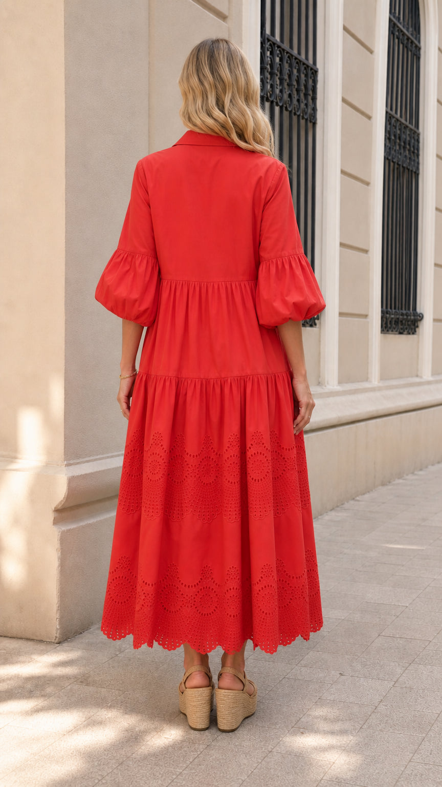 Back view of woman wearing red tiered dress
