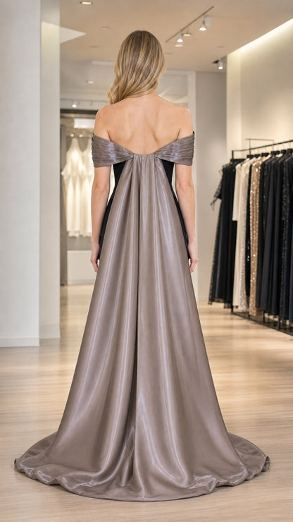 Back view showcasing the floor-length draped cape