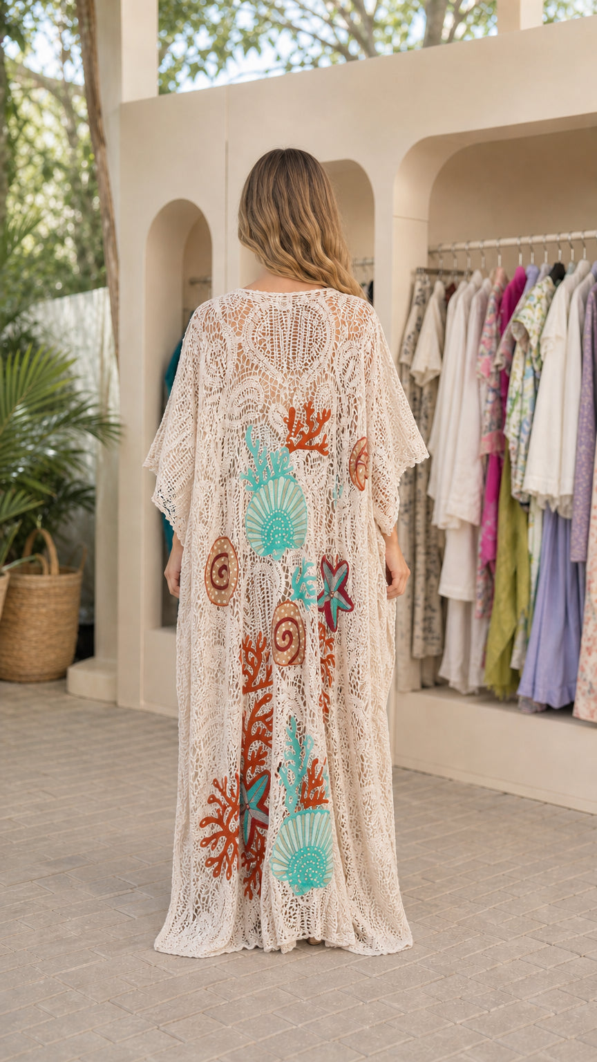 Back view of beige crochet beach kaftan