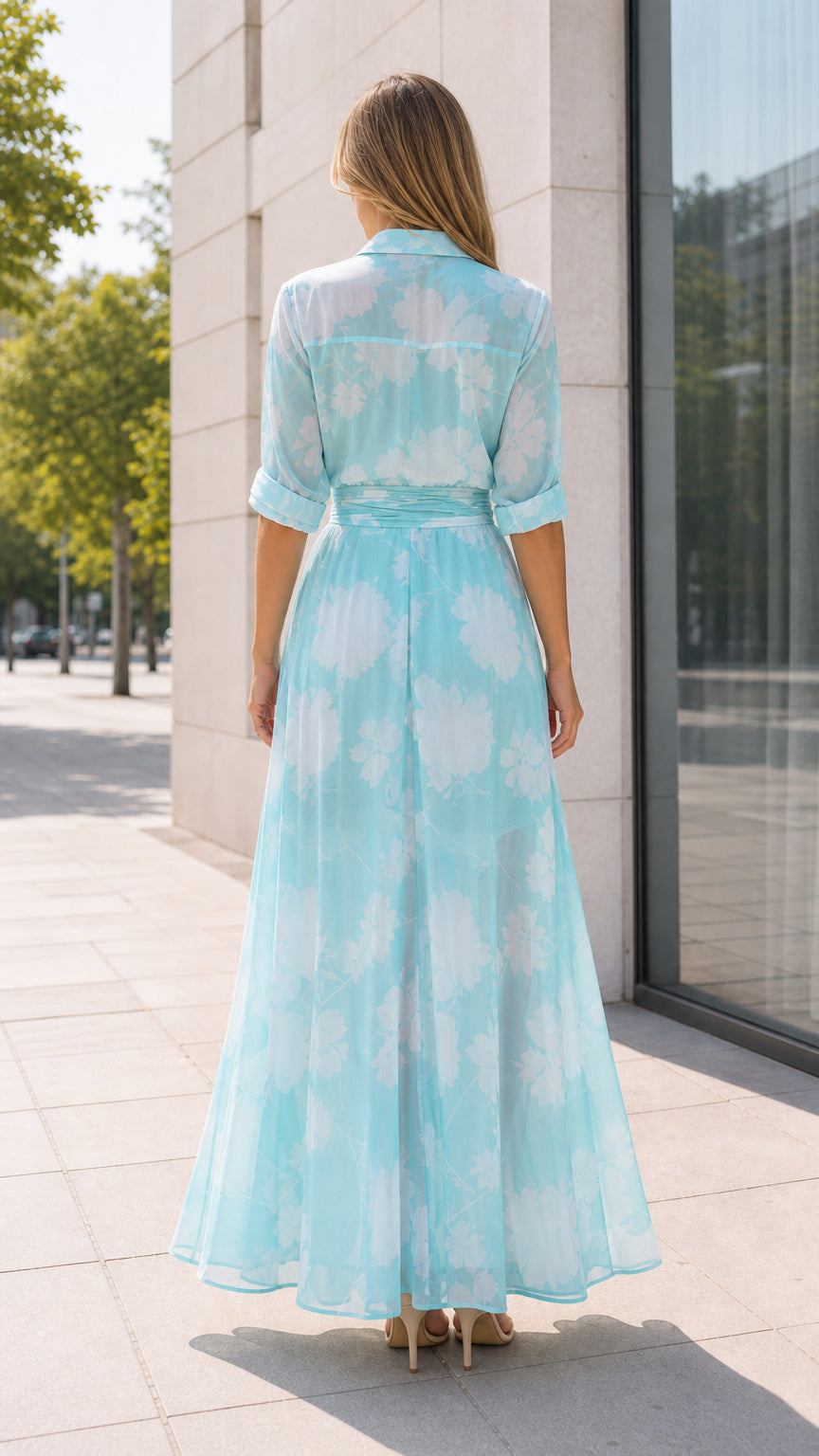 Aqua floral maxi shirt dress shown from the back with tied waist