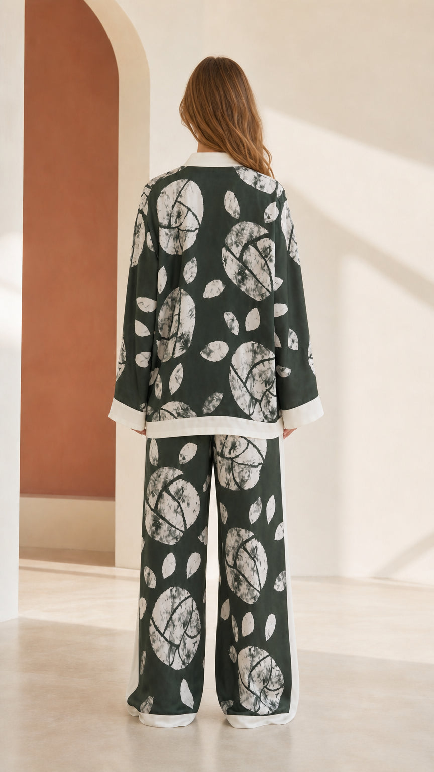 Back view of woman wearing Forest Green printed lounge set