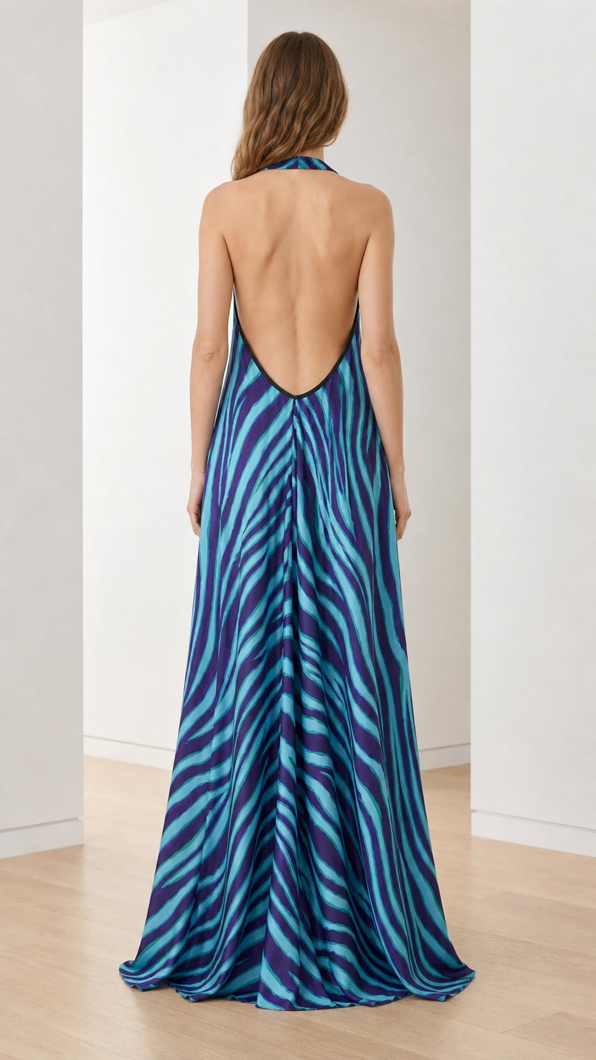 Back view showcasing open back design of blue zebra print dress