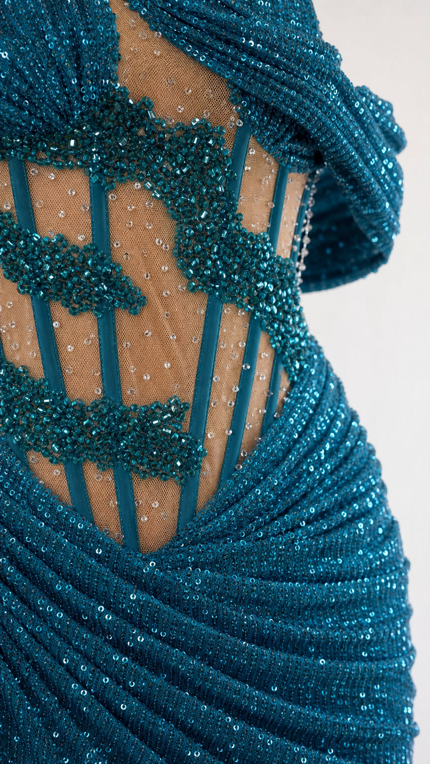 Close-up of sheer illusion corset bodice with beadwork