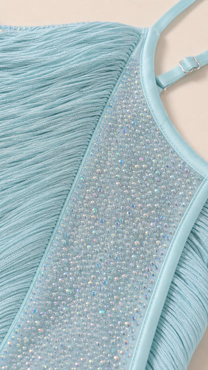 Close up of light blue fabric and rhinestone side panel detail
