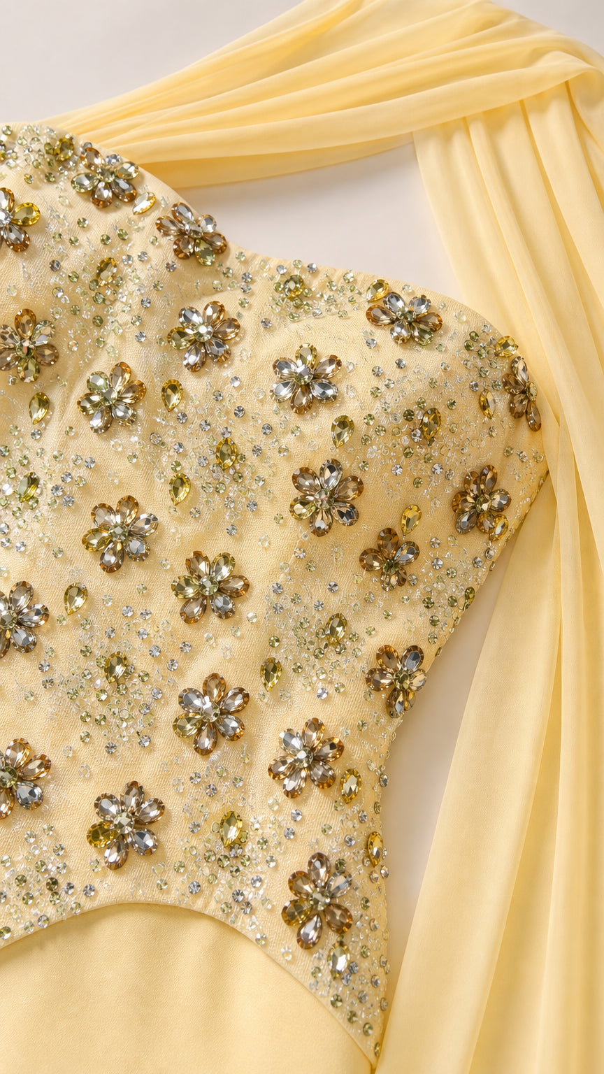 Close-up detail of embellished floral beadwork on the bodice